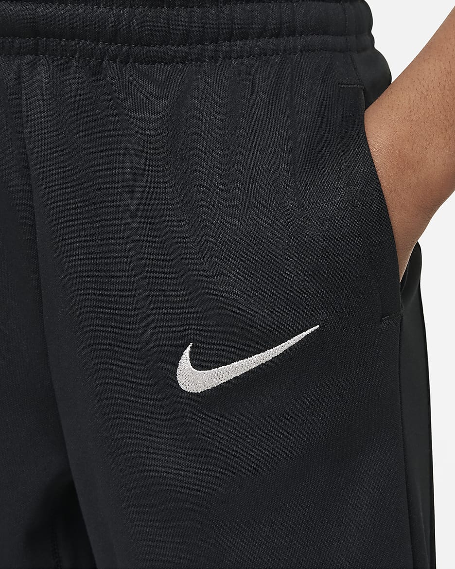 Liverpool FC Academy Pro Pantalons de futbol de teixit Knit Nike Dri-FIT - Nen/a petit/a - Negre/Gym Red/Light Orewood Brown