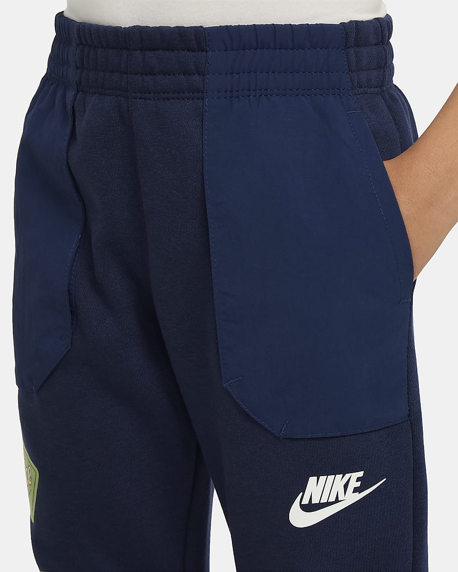 Pantalones de entrenamiento de tejido Fleece para niños talla pequeña Nike Sportswear
 - Azul marino medianoche