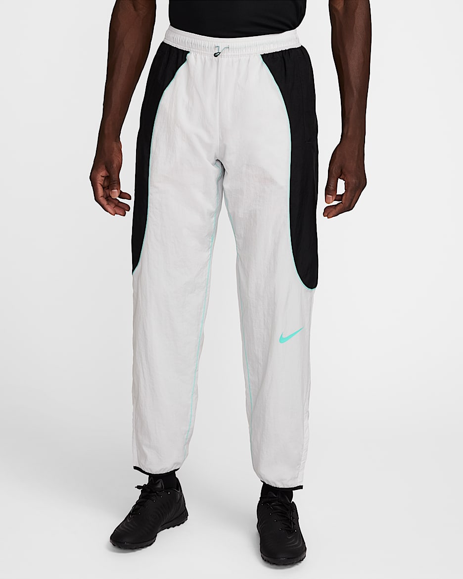 Pants de fútbol repelentes al agua para hombre Nike Strike+ - Polvo fotón/Negro/Turquesa dinámico/Turquesa dinámico