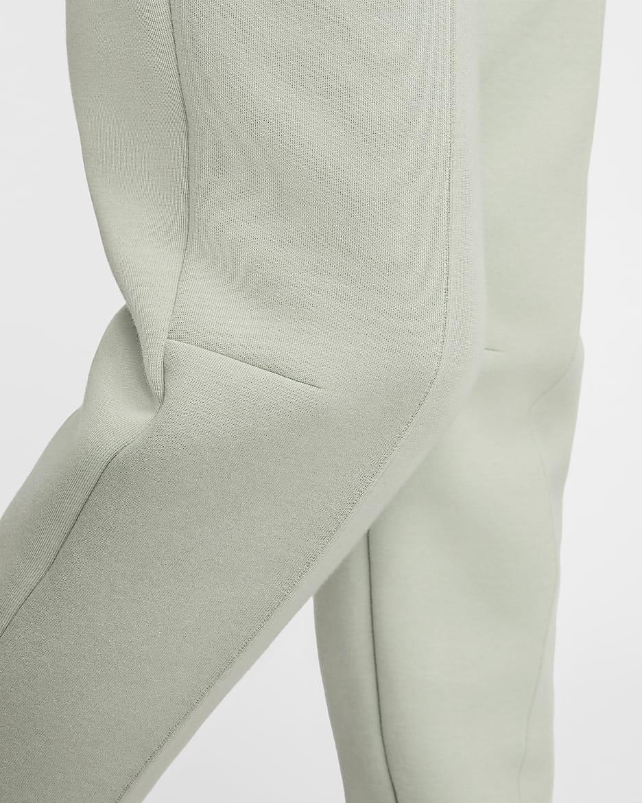 Nike Sportswear Tech Fleece Joggingbroek met halfhoge taille voor dames - Jade Horizon/Zwart