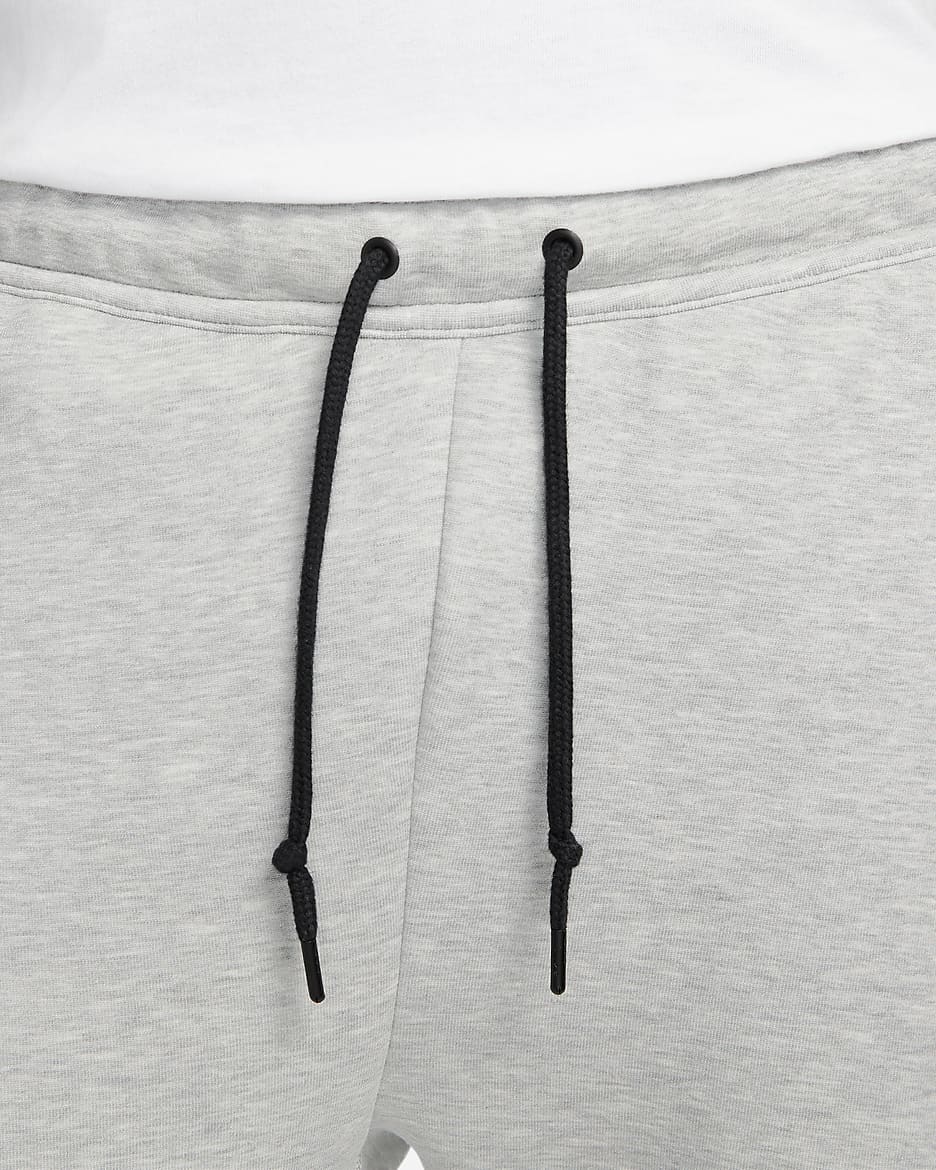 Joggingbyxor Nike Sportswear Tech Fleece för män - Dark Grey Heather/Svart