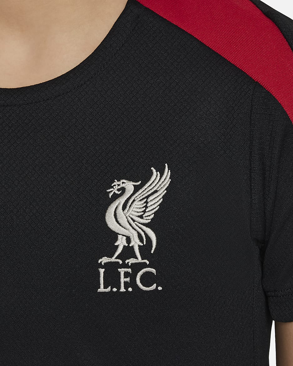 Liverpool F.C. Strike Older Kids' Nike Dri-FIT Football Short-Sleeve Knit Top - Black/Black/Gym Red/Light Orewood Brown