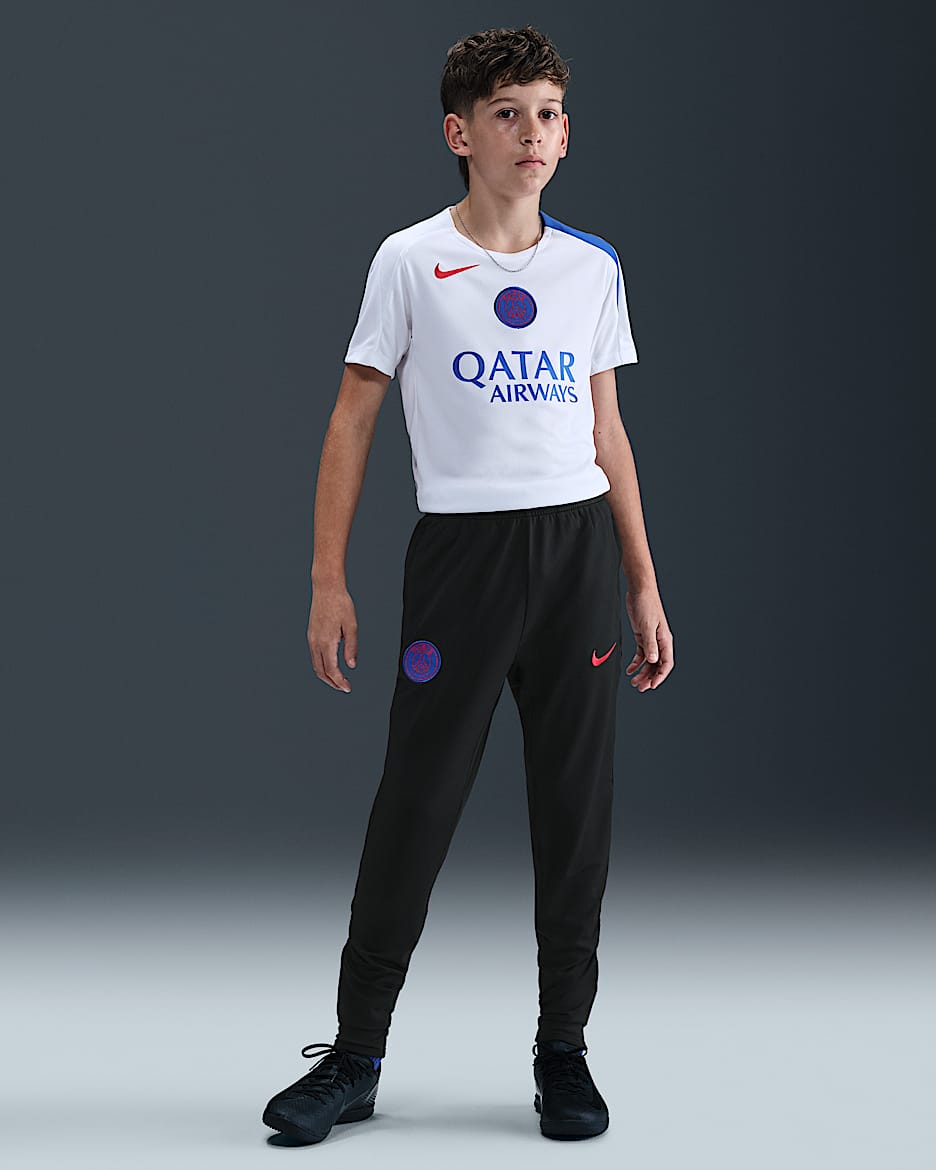 Pantalon de foot en maille Nike Dri-FIT Total 90 Paris Saint-Germain Strike 3e tenue pour ado - Noir/Hyper Royal/Global Red