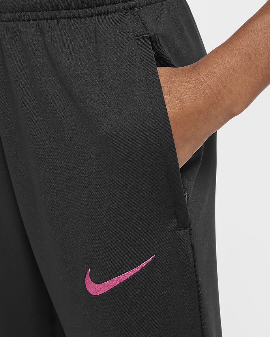 Pantaloni da calcio Nike Dri-FIT Chelsea FC Strike per ragazzo/a – Terza - Nero/Pink Prime