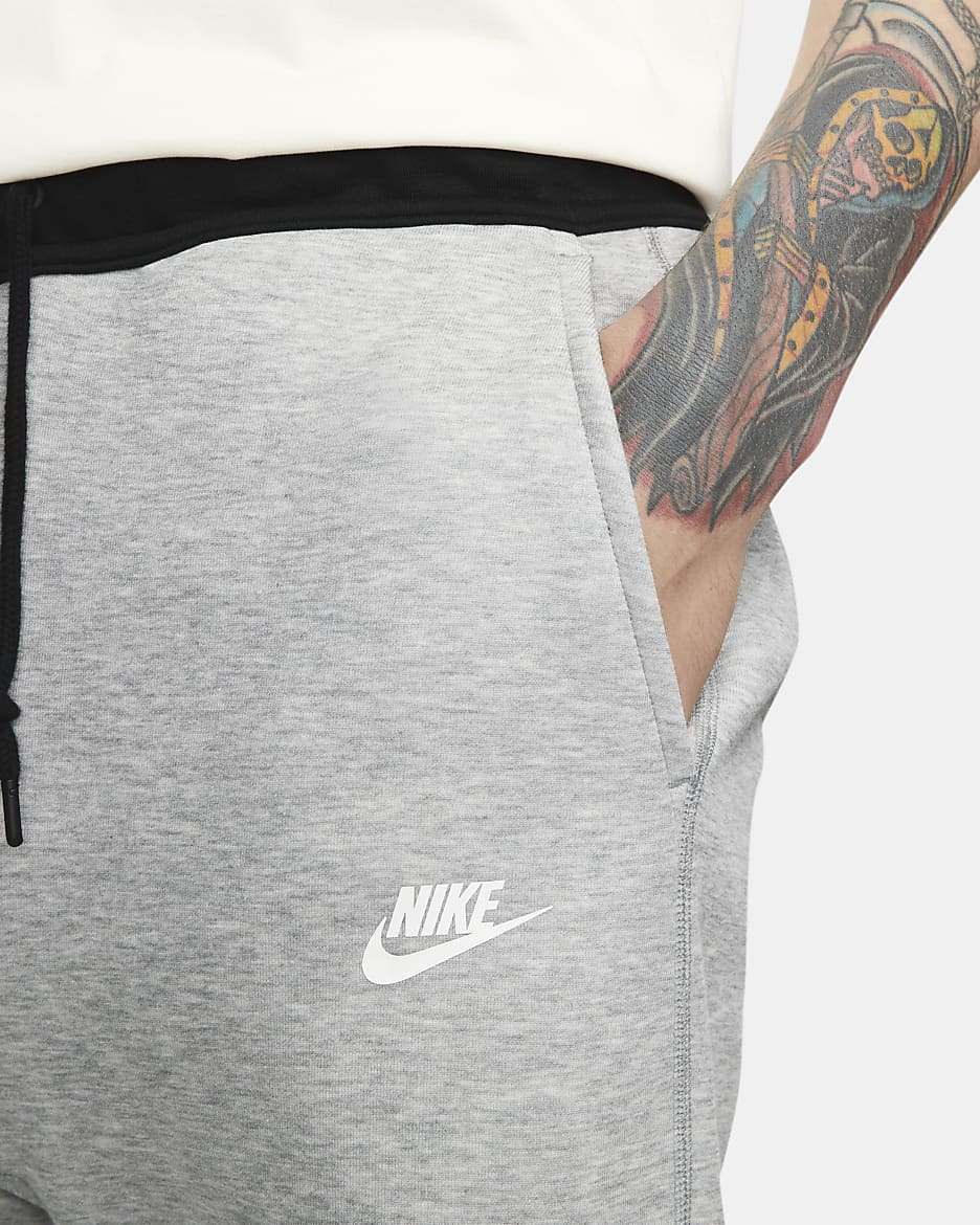 Joggingbyxor Nike Sportswear Tech Fleece för män - Dark Grey Heather/Svart/Vit