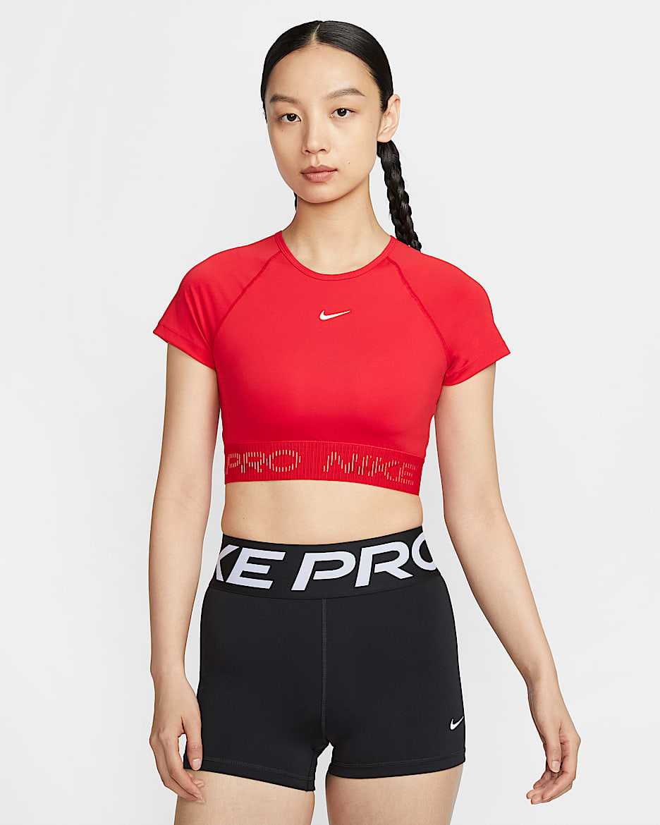 Nike Pro 女款 Dri-FIT 短袖短版圖樣上衣 - University Red/Dark Team Red/Magic Ember/白色