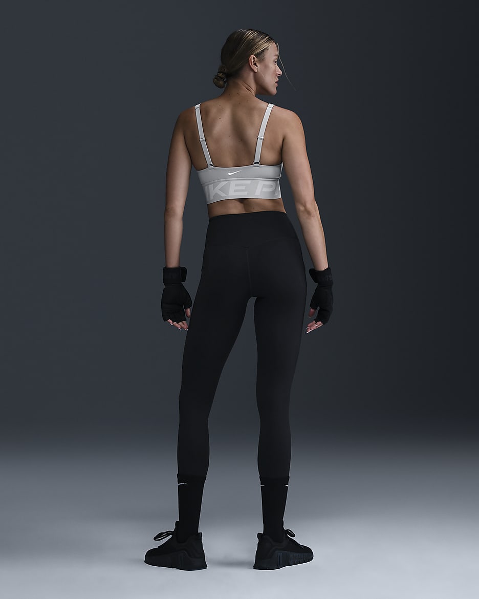 Dámská sportovní podprsenka Nike Pro Indy Plunge s vycpávkami a střední oporou - Light Smoke Grey/Photon Dust/Bílá