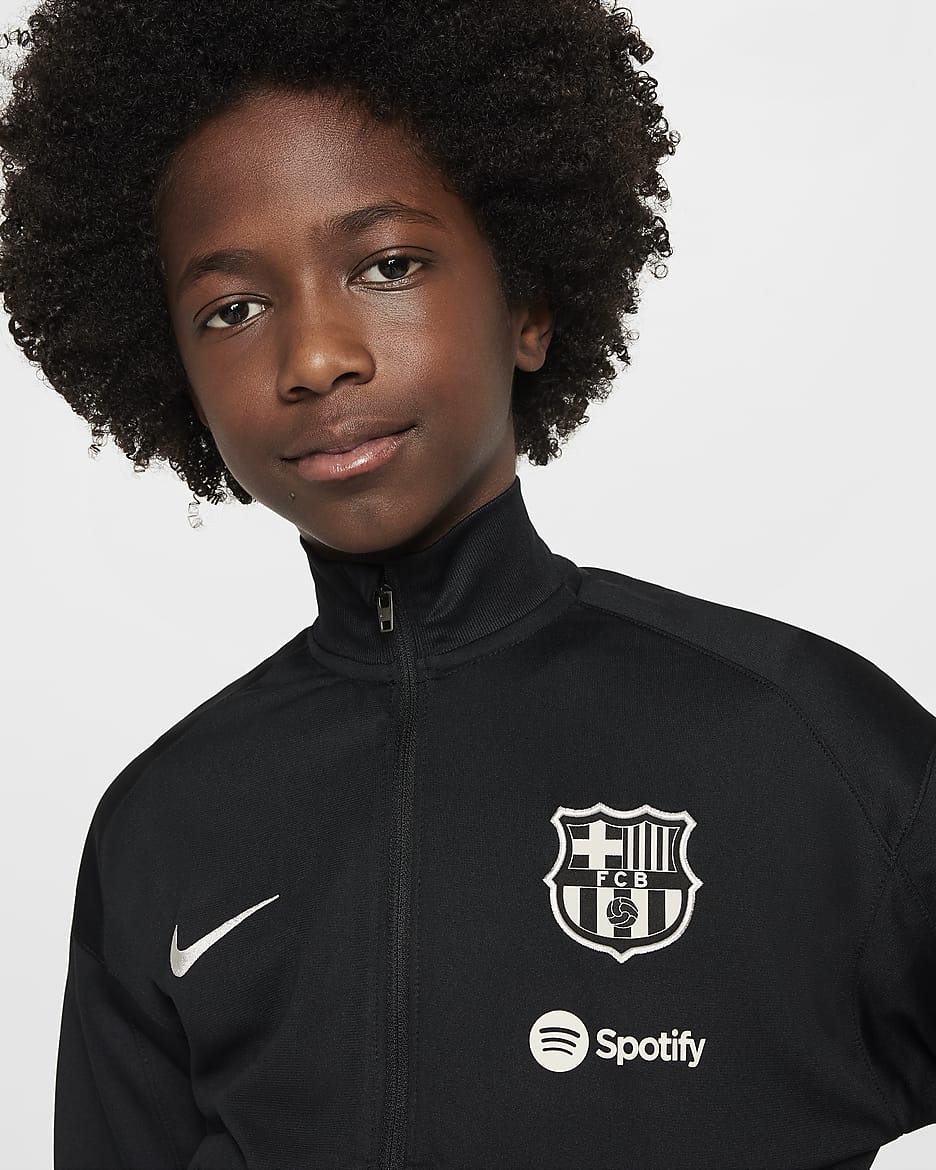 F.C. Barcelona Strike Older Kids' Nike Dri-FIT Football Knit Tracksuit - Black/Noble Red/Deep Royal Blue/Light Orewood Brown