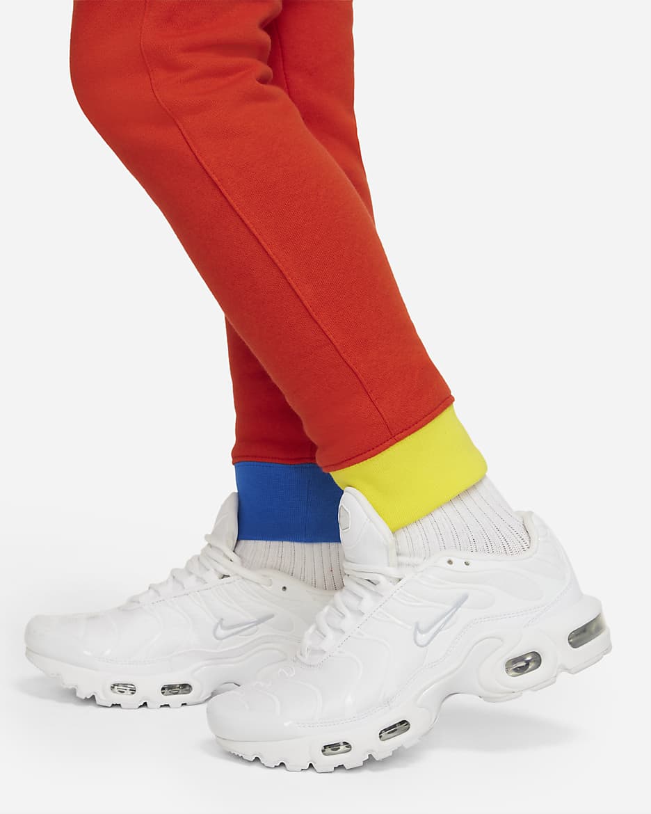 Nike Sportswear Club Big Kids' Joggers - Habanero Red/Yellow Strike/Light Photo Blue