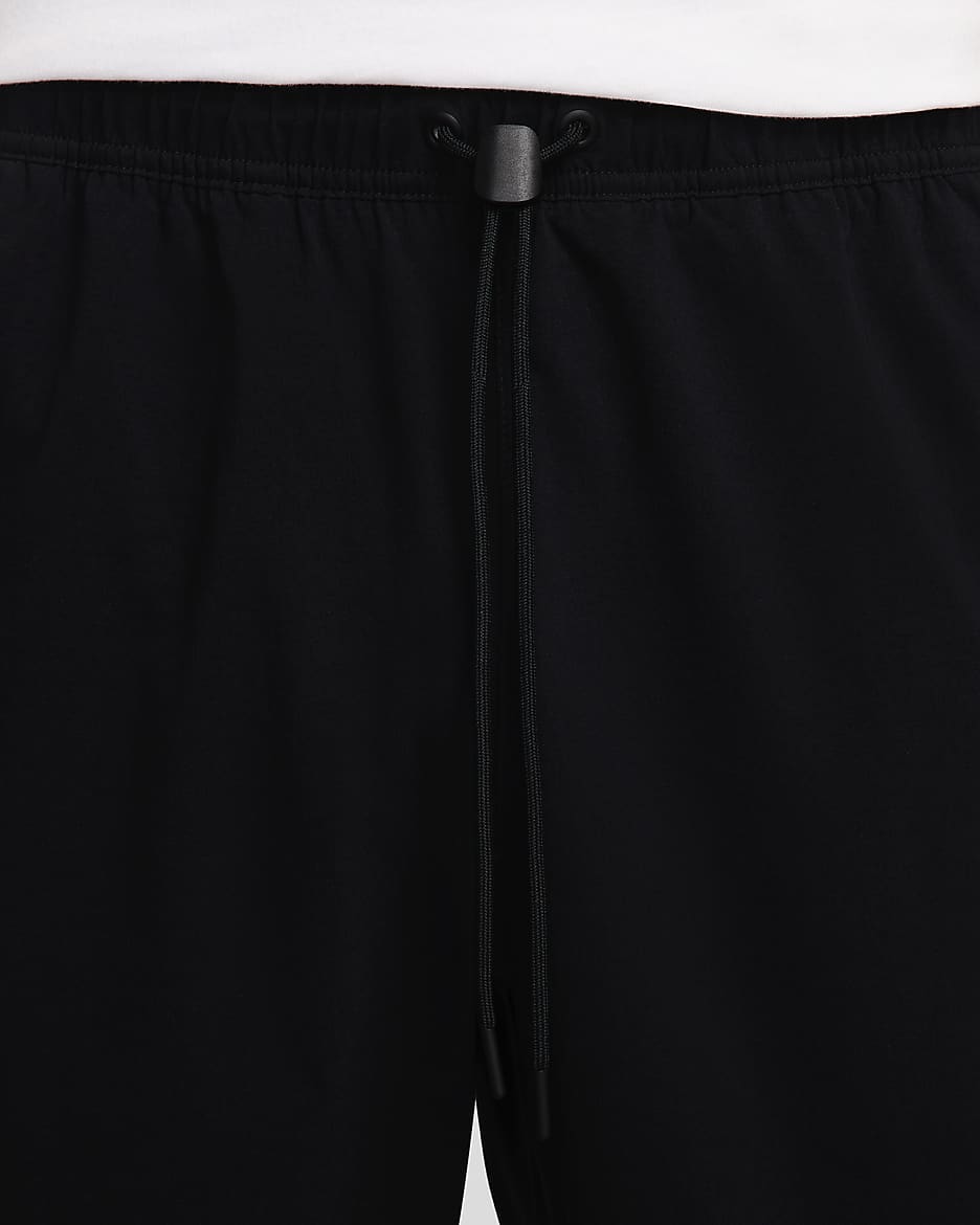 Pantaloni in tessuto Nike Tech – Uomo - Nero/Nero