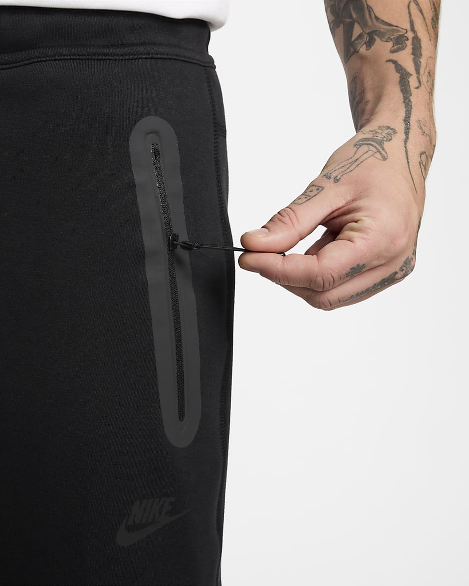 Nike Tech Pantalons de teixit Fleece amb vora oberta - Home - Negre/Negre