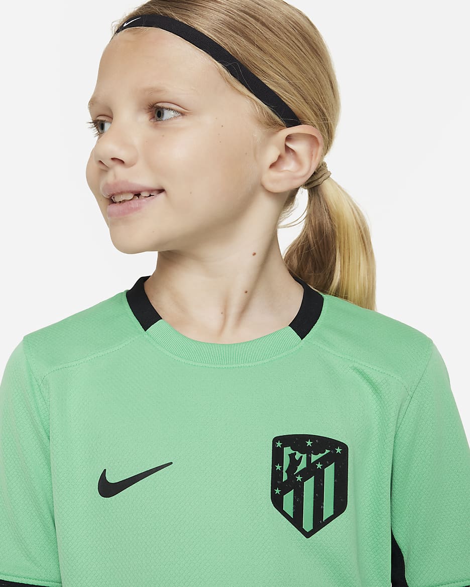 Koszulka piłkarska dla dużych dzieci Nike Dri-FIT Atlético Madryt Stadium 2023/24 (wersja trzecia) - Spring Green/Czerń/Czerń