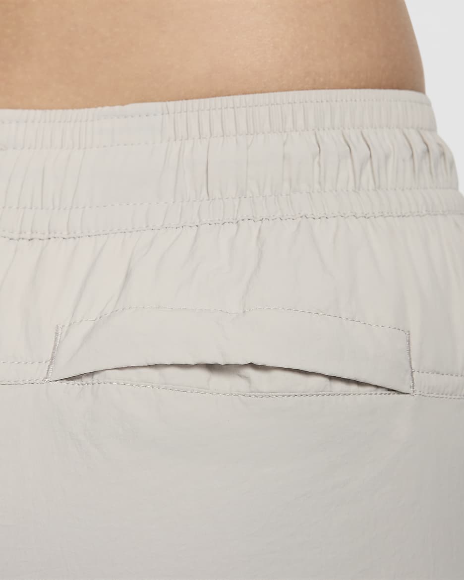 Pantaloni Repel a vita media con zip Nike Sportswear Collection – Donna - Light Iron Ore/Bianco