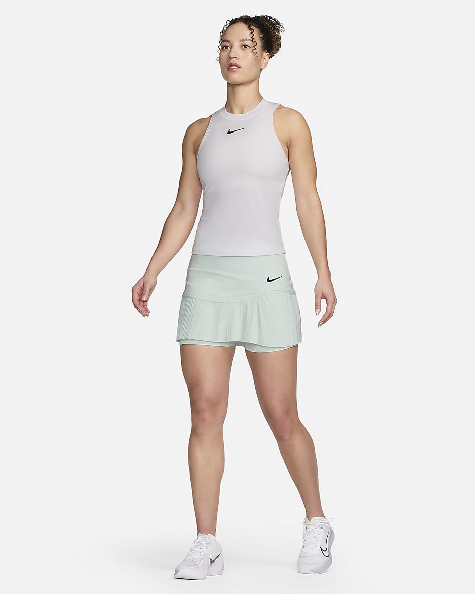 Jupe de tennis Dri-FIT Nike Advantage pour femme - Barely Green/Barely Green/Noir