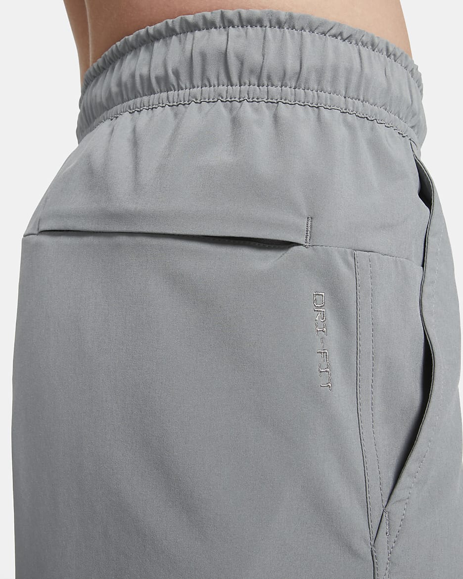 Nike Unlimited multifunctionele niet-gevoerde herenshorts met Dri-FIT (18 cm) - Smoke Grey/Zwart/Smoke Grey