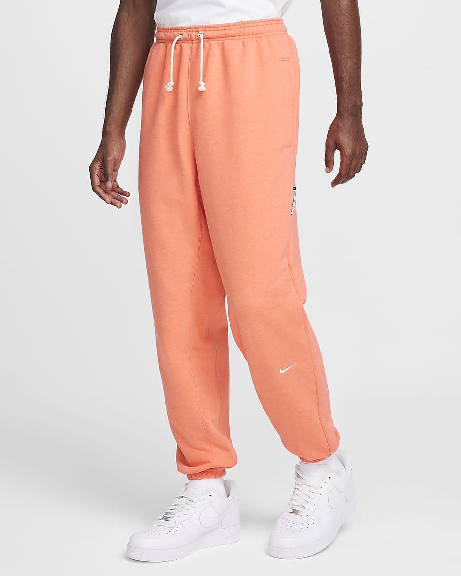Pants de básquetbol Dri-FIT para hombre Nike Standard Issue - Mango salvaje claro/Jaspeado/Marfil pálido