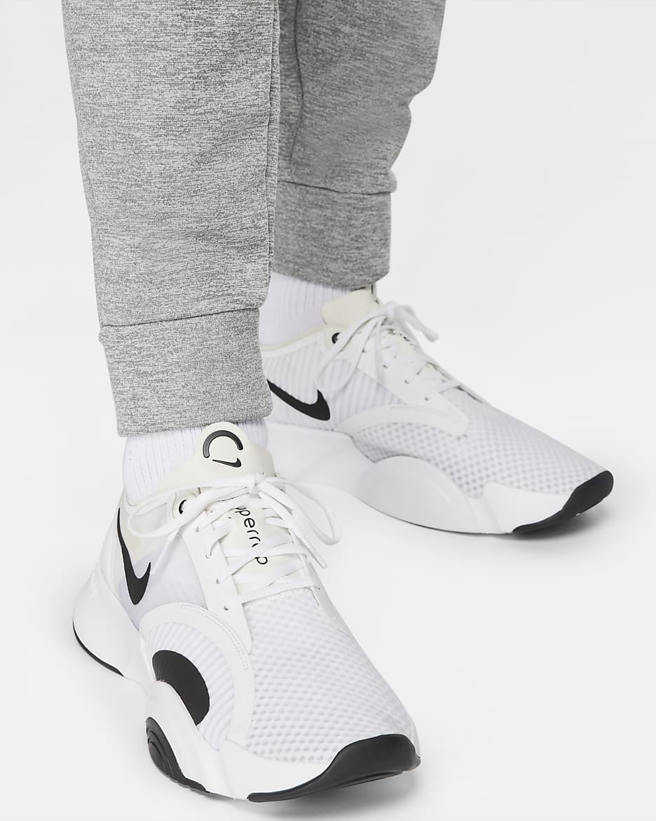 Nike Therma-FIT avsmalnet treningsbukse til herre - Dark Grey Heather/Particle Grey/Svart