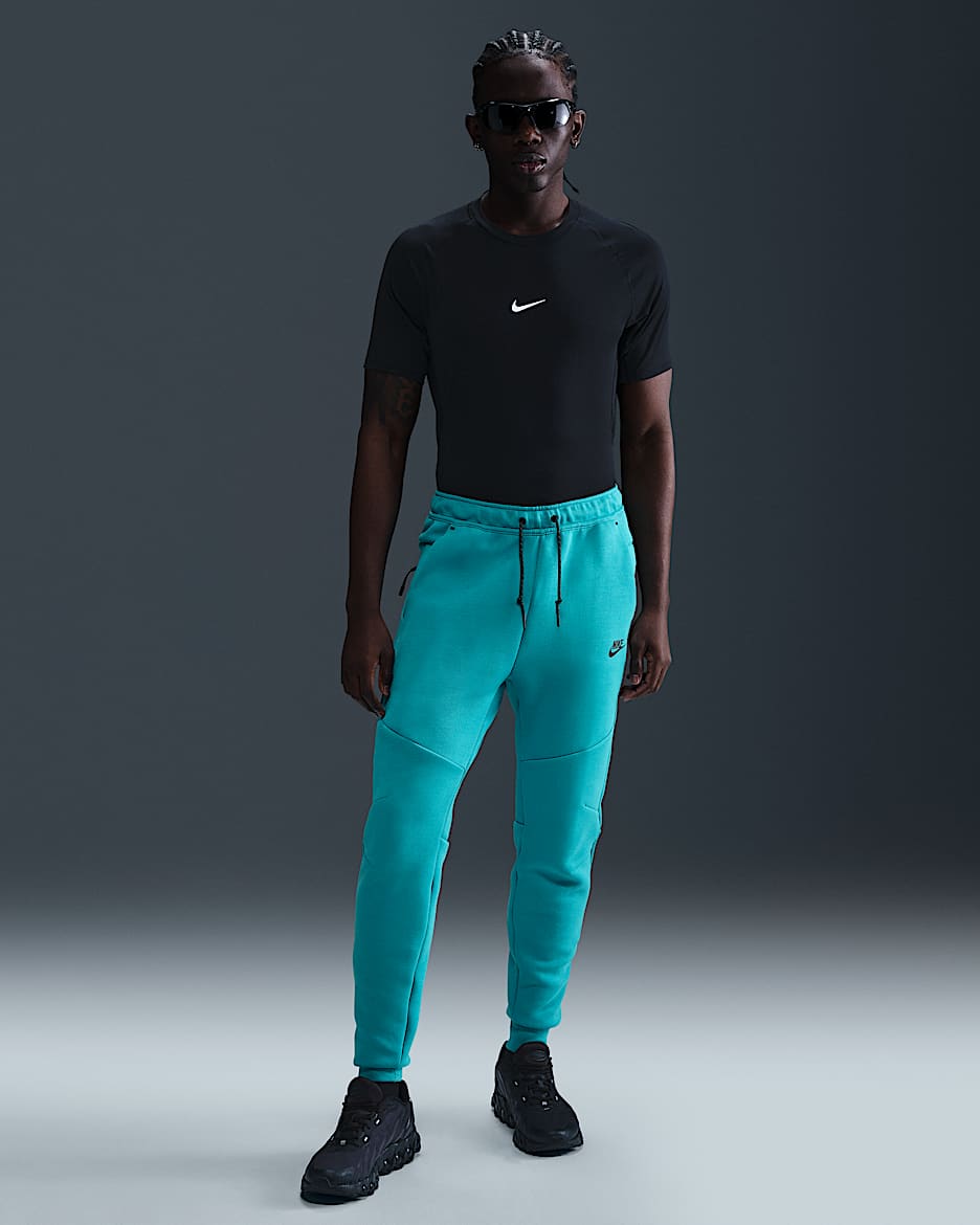 Calças desportivas de lã cardada Nike Tech para homem - Dusty Cactus/Preto