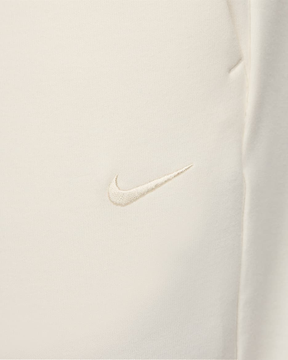 Calças desportivas versáteis Dri-FIT UV Nike Primary para homem - Pale Ivory/Pale Ivory