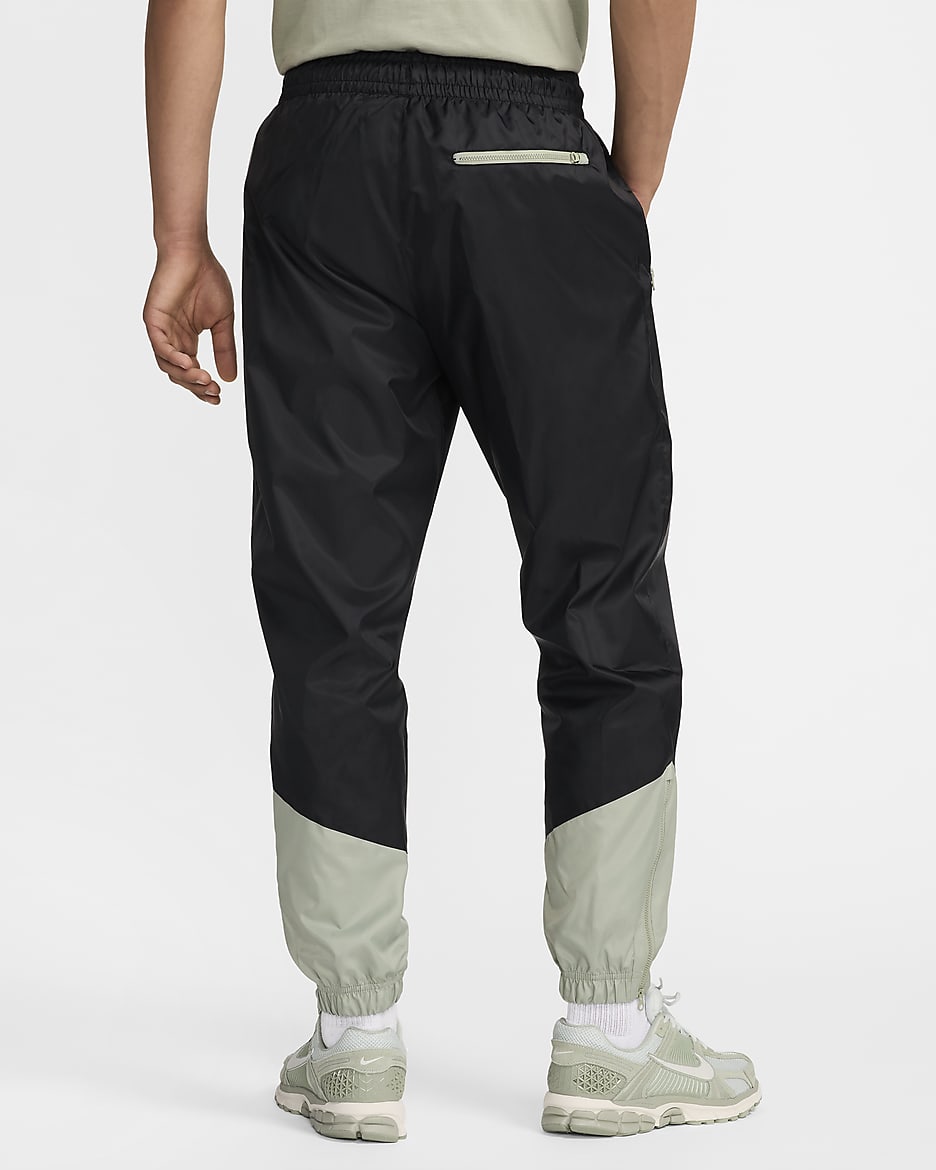 Pants forrados de tejido Woven para hombre Nike Windrunner - Negro/Horizonte jade/Horizonte jade