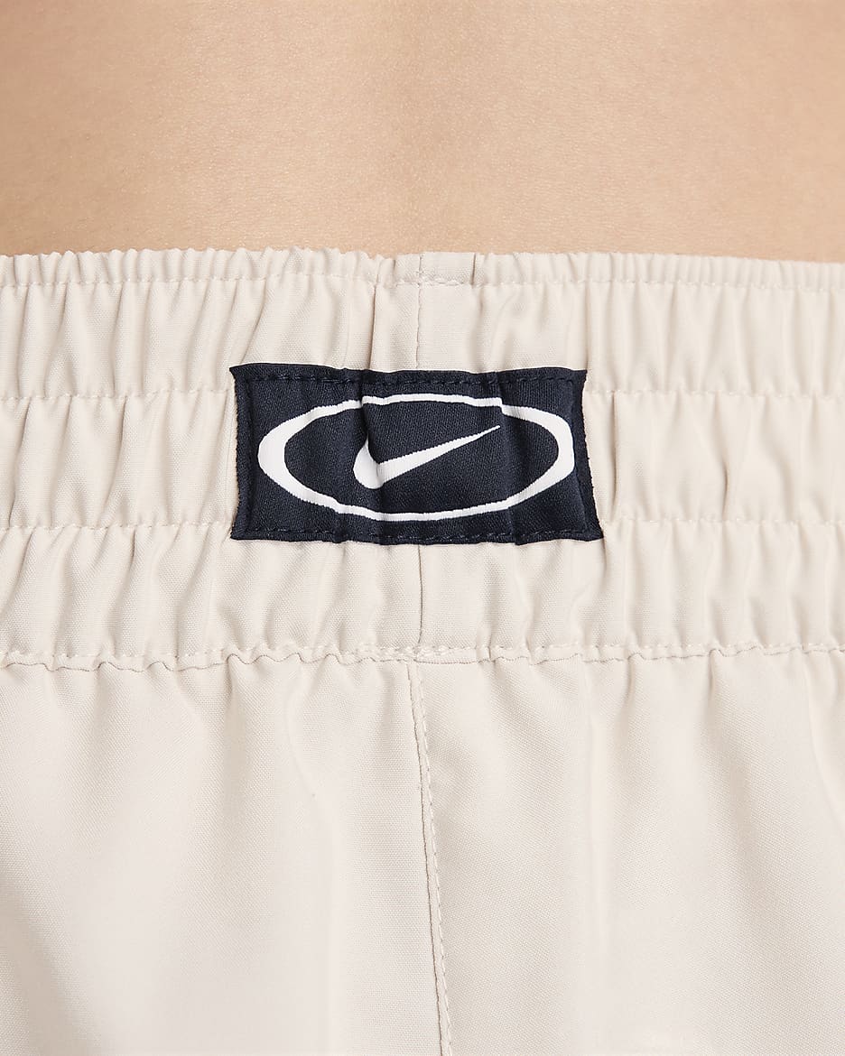 กางเกงวิ่งขายาวเอวปานกลาง Dri-FIT ผู้หญิง Nike Dri-FIT Seasonal Novelty - Light Orewood Brown/ขาว