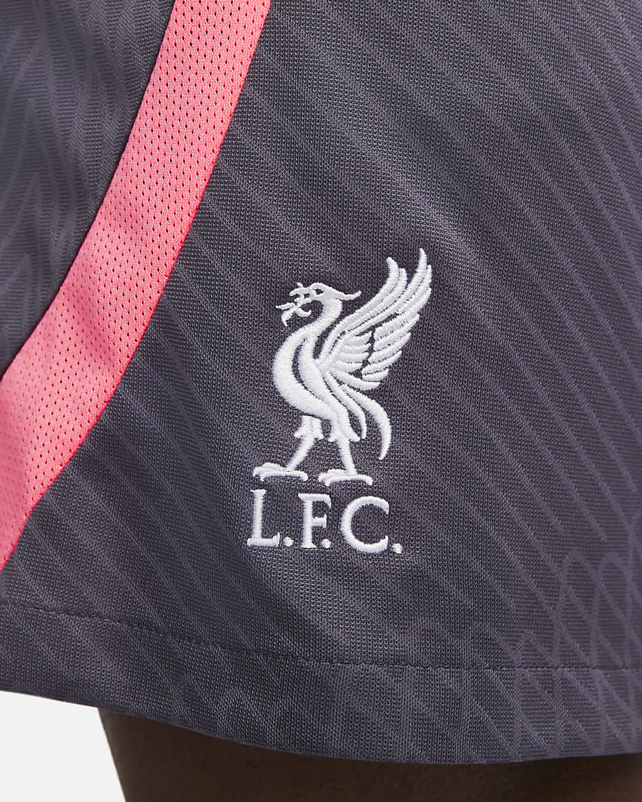 Liverpool FC Strike harmadik Nike Dri-FIT kötött férfi futballrövidnadrág - Gridiron/Hot Punch/Fehér