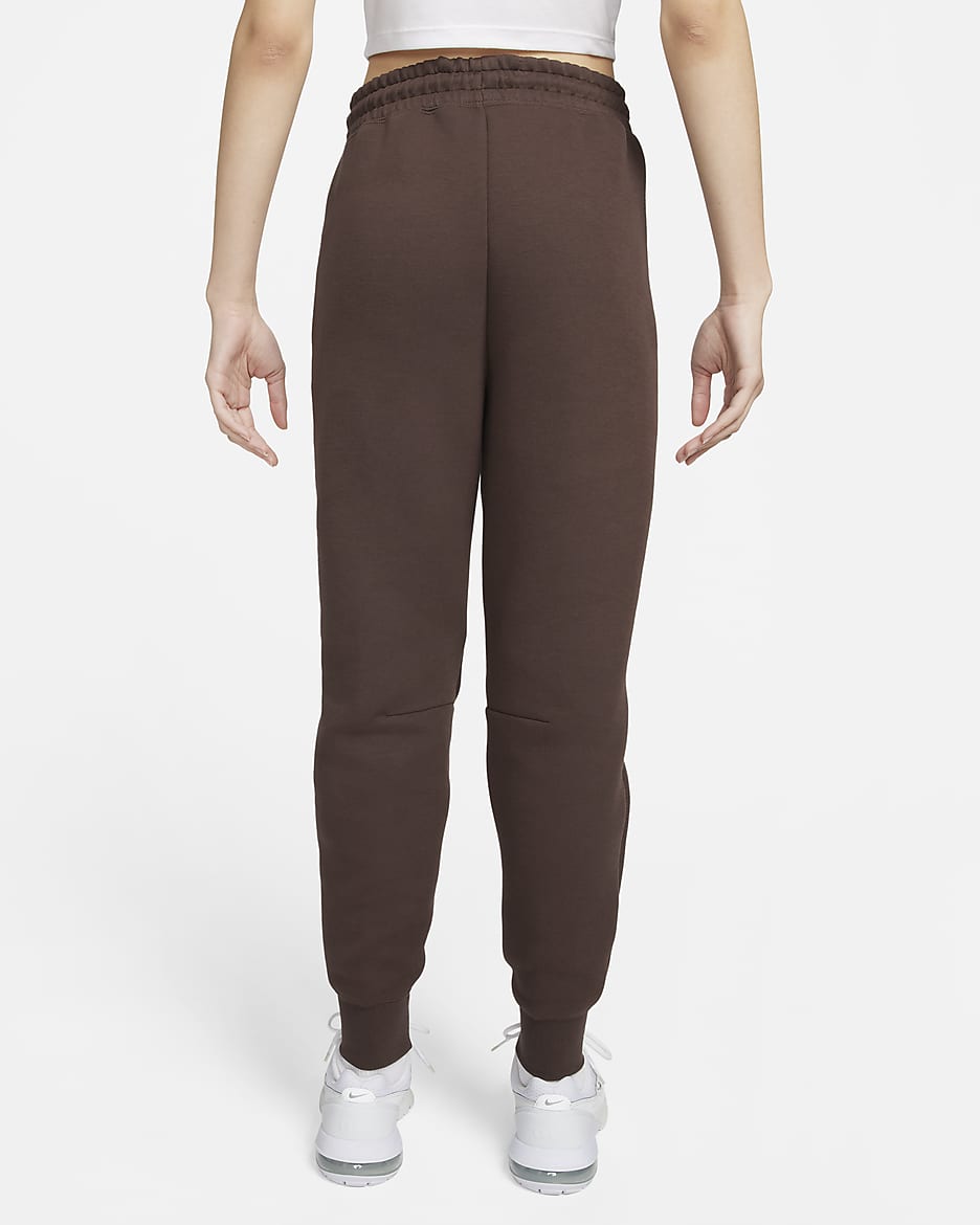 Pantaloni jogger a vita media Nike Sportswear Tech Fleece – Donna - Baroque Brown/Nero