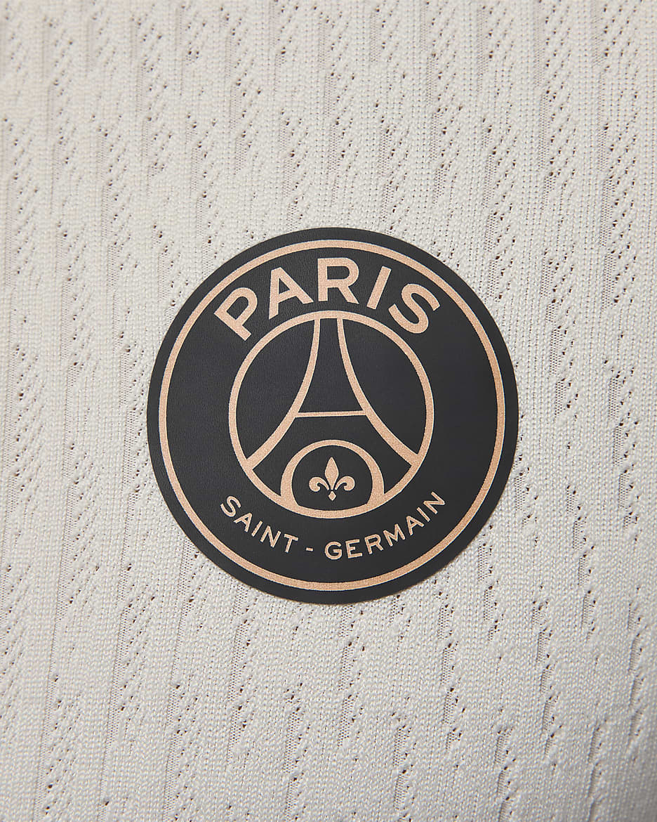 Męska treningowa koszulka piłkarska z dzianiny Jordan Dri-FIT ADV Paris Saint-Germain Strike Elite (wersja trzecia) - Pale Ivory/Rust Pink/Czerń