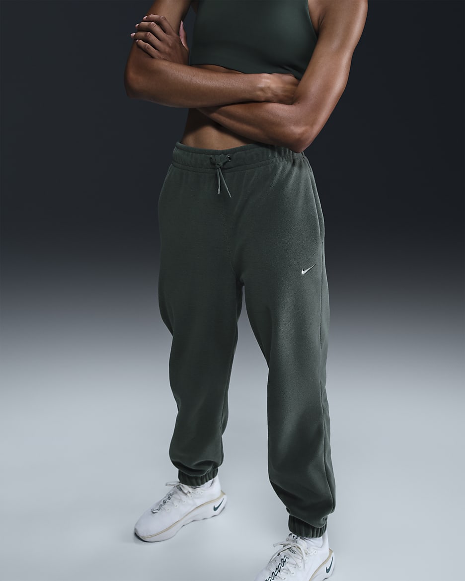 Nike Therma-FIT One Pantalons amples de teixit Fleece - Dona - Vintage Green/Pale Ivory