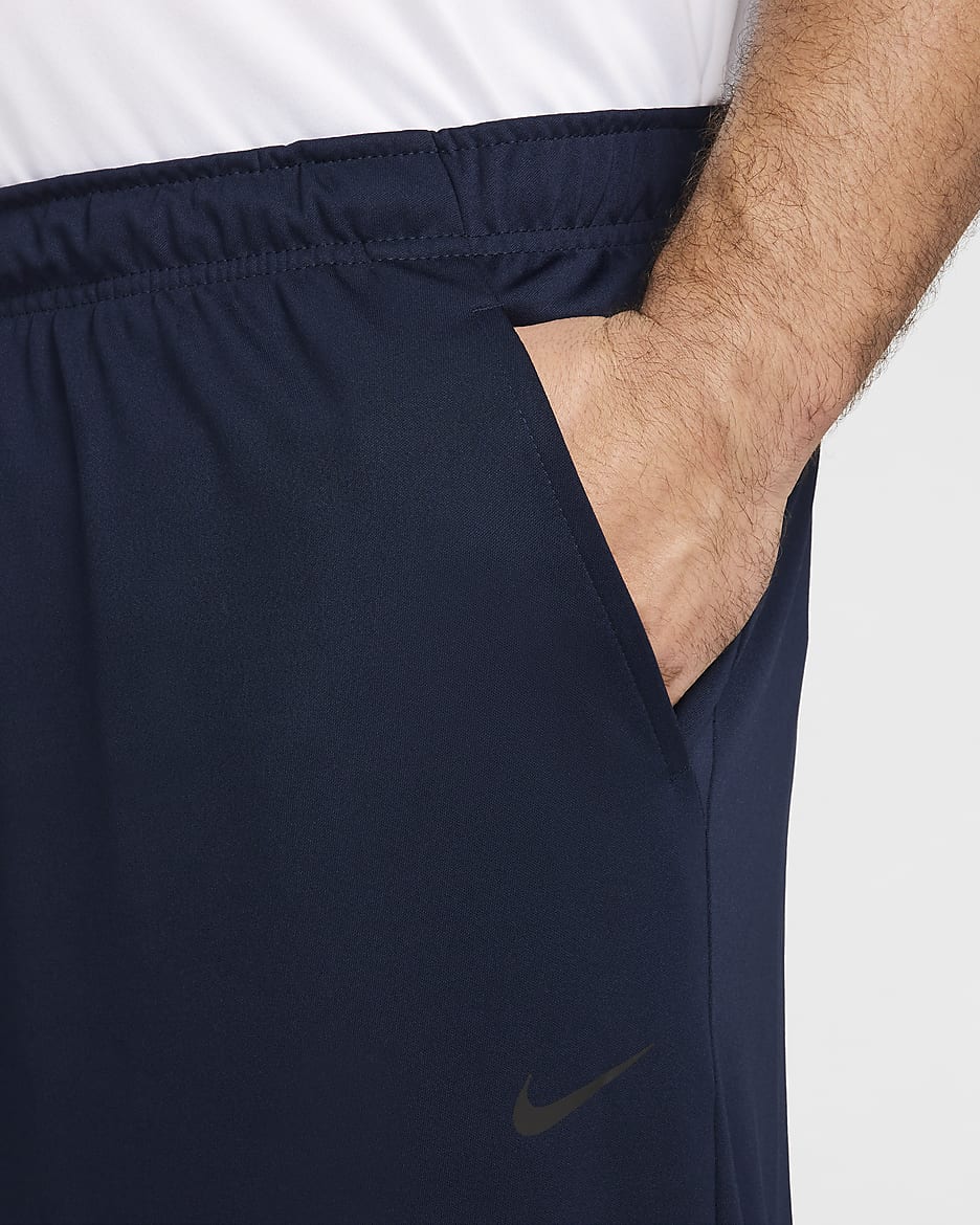 Pants Dri-FIT versátiles con dobladillo abierto para hombre Nike Totality - Obsidiana/Negro