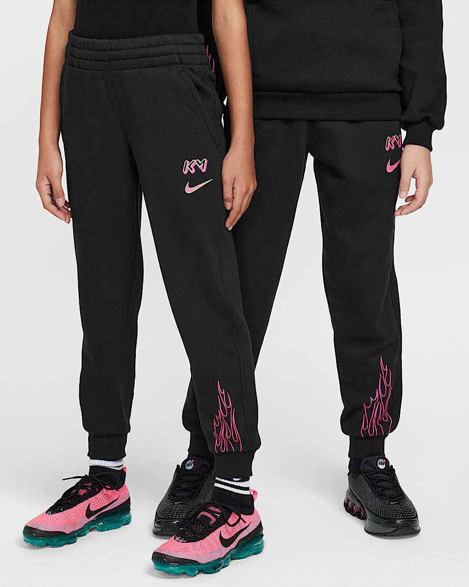 Joggers de fútbol para niños talla grande Kylian Mbappé Club Fleece - Negro/Hiperrosa/Oro metalizado