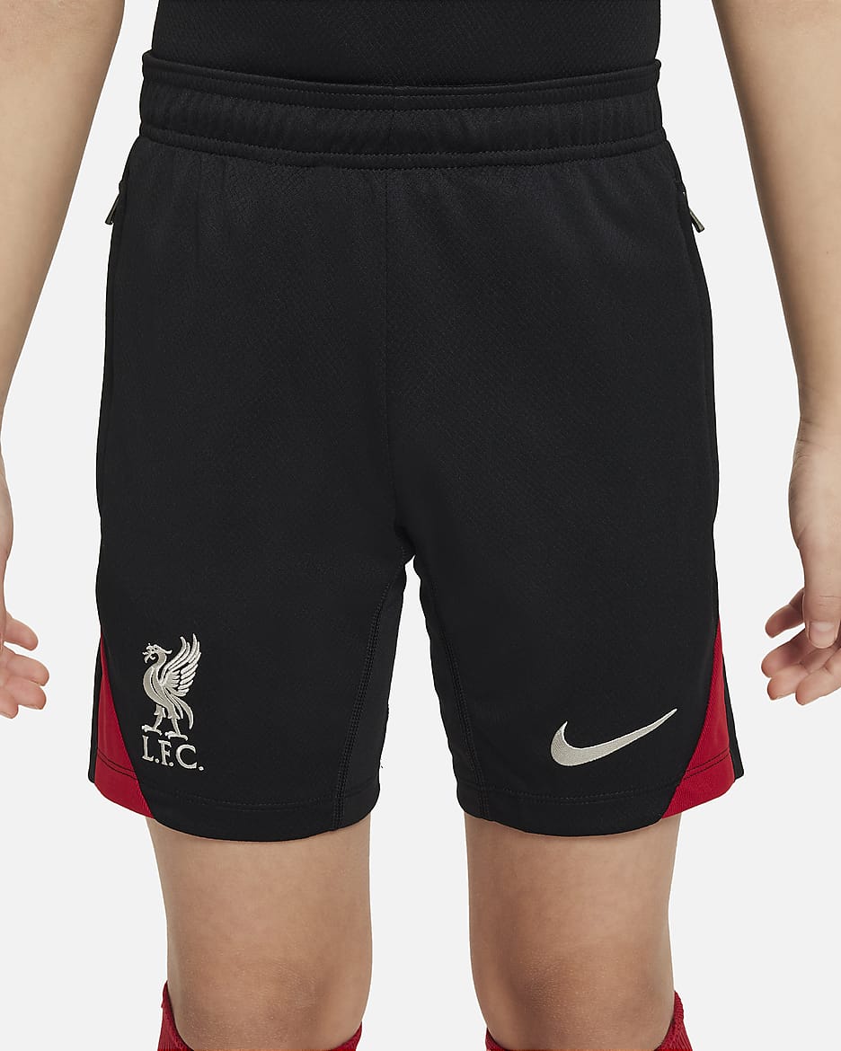 Liverpool F.C. Strike Older Kids' Nike Dri-FIT Football Knit Shorts - Black/Gym Red/Light Orewood Brown