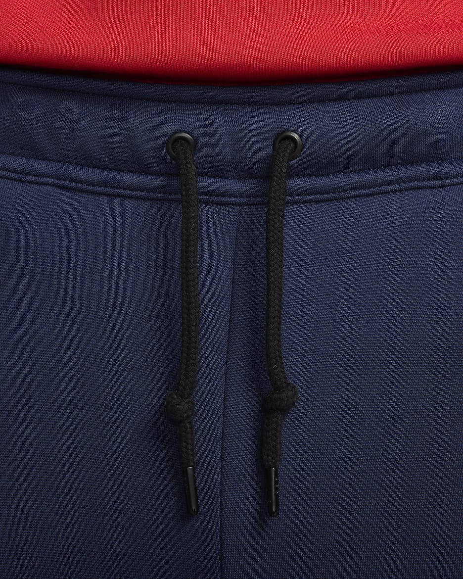 Paris Saint-Germain Tech Fleece Nike voetbalbroek voor heren - Midnight Navy/Wit