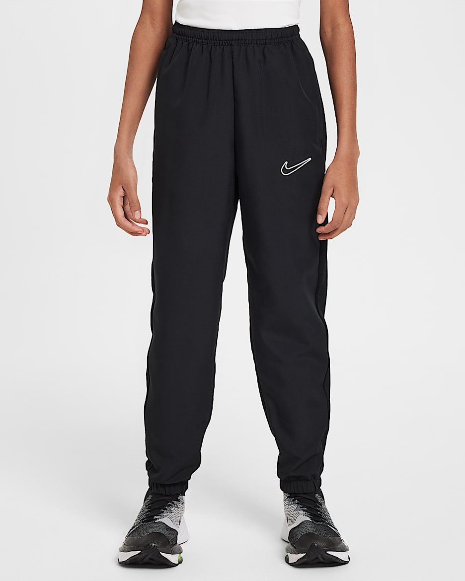 Nike Academy Older Kids' Dri-FIT Football Tracksuit Bottoms - Black/Black/White