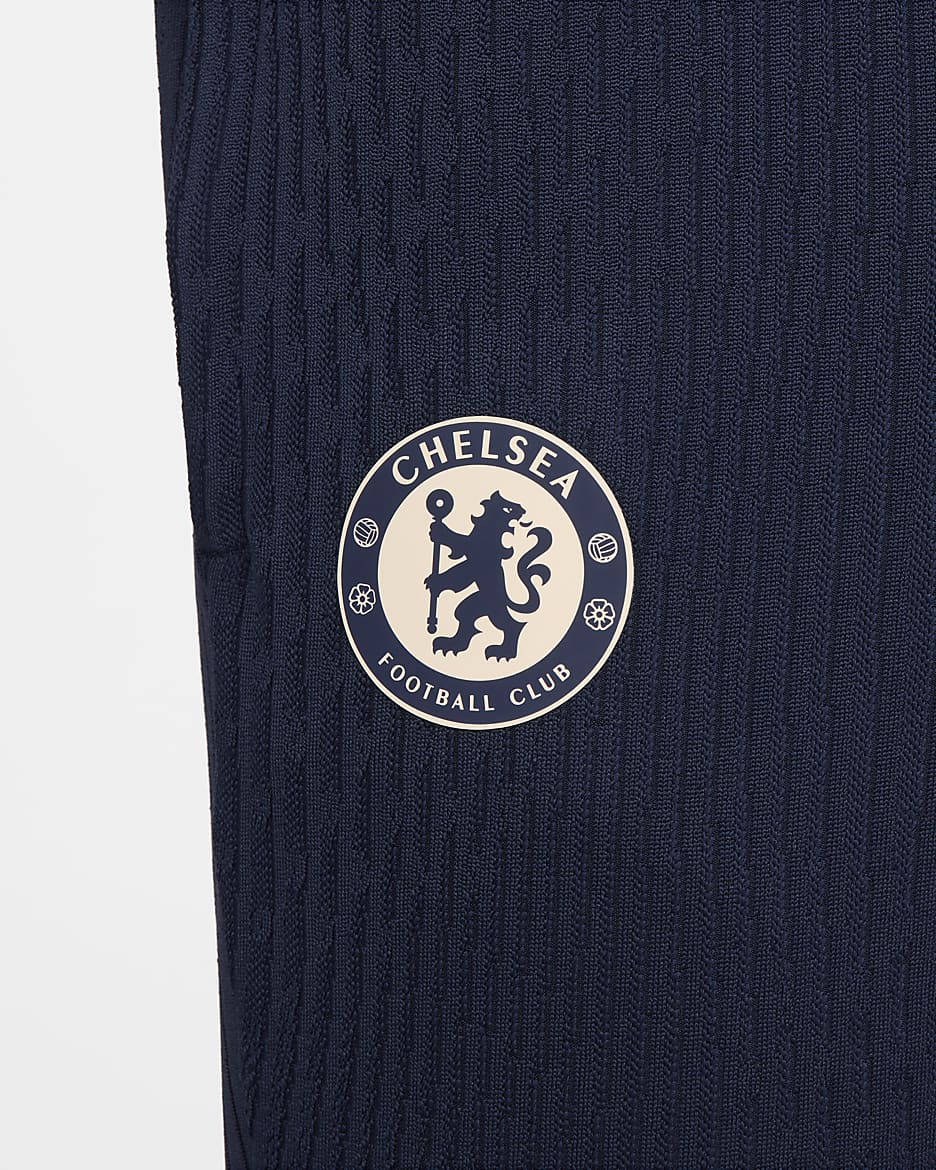 Chelsea FC Strike Elite Pantalón de fútbol de tejido Knit Nike Dri-FIT ADV - Hombre - Obsidian/Light Photo Blue/Guava Ice