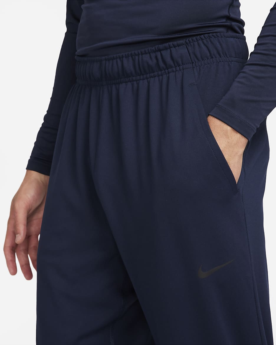 Pants Dri-FIT versátiles con dobladillo abierto para hombre Nike Totality - Obsidiana/Negro