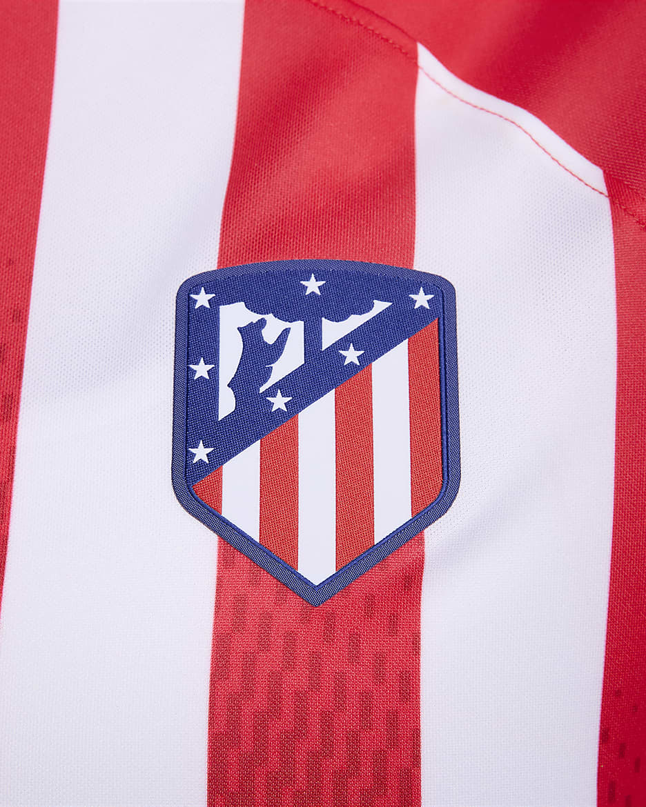 Jersey de fútbol Nike Dri-FIT del Club Atlético de Madrid local 2023/24 Stadium para mujer - Rojo deportivo/Rojo mundial/Blanco/Azul eléctrico