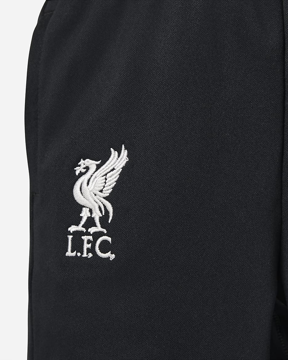 FC Liverpool Academy Pro Nike Dri-FIT Fußballhose aus Strick für jüngere Kinder - Schwarz/Gym Red/Light Orewood Brown