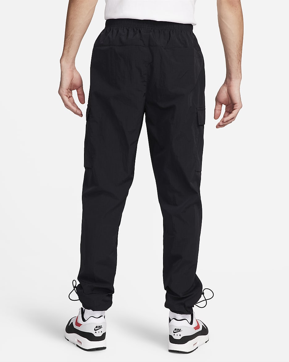 Pantaloni leggeri in tessuto Nike Air – Uomo - Nero