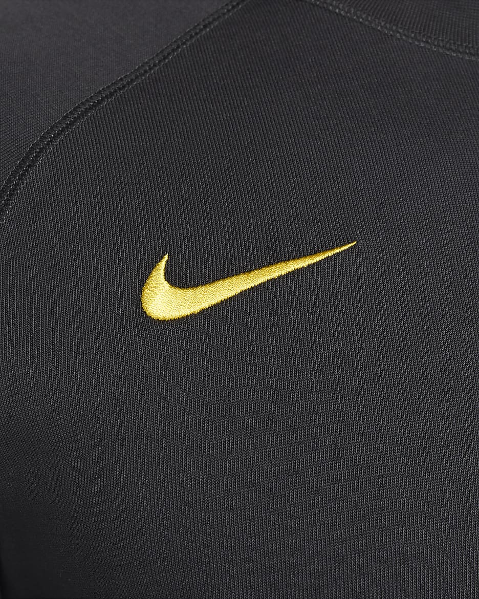 Męska koszulka piłkarska z krótkim rękawem Nike
Liverpool F.C. Travel (wersja trzecia) - Dark Smoke Grey/Chrome Yellow/Chrome Yellow