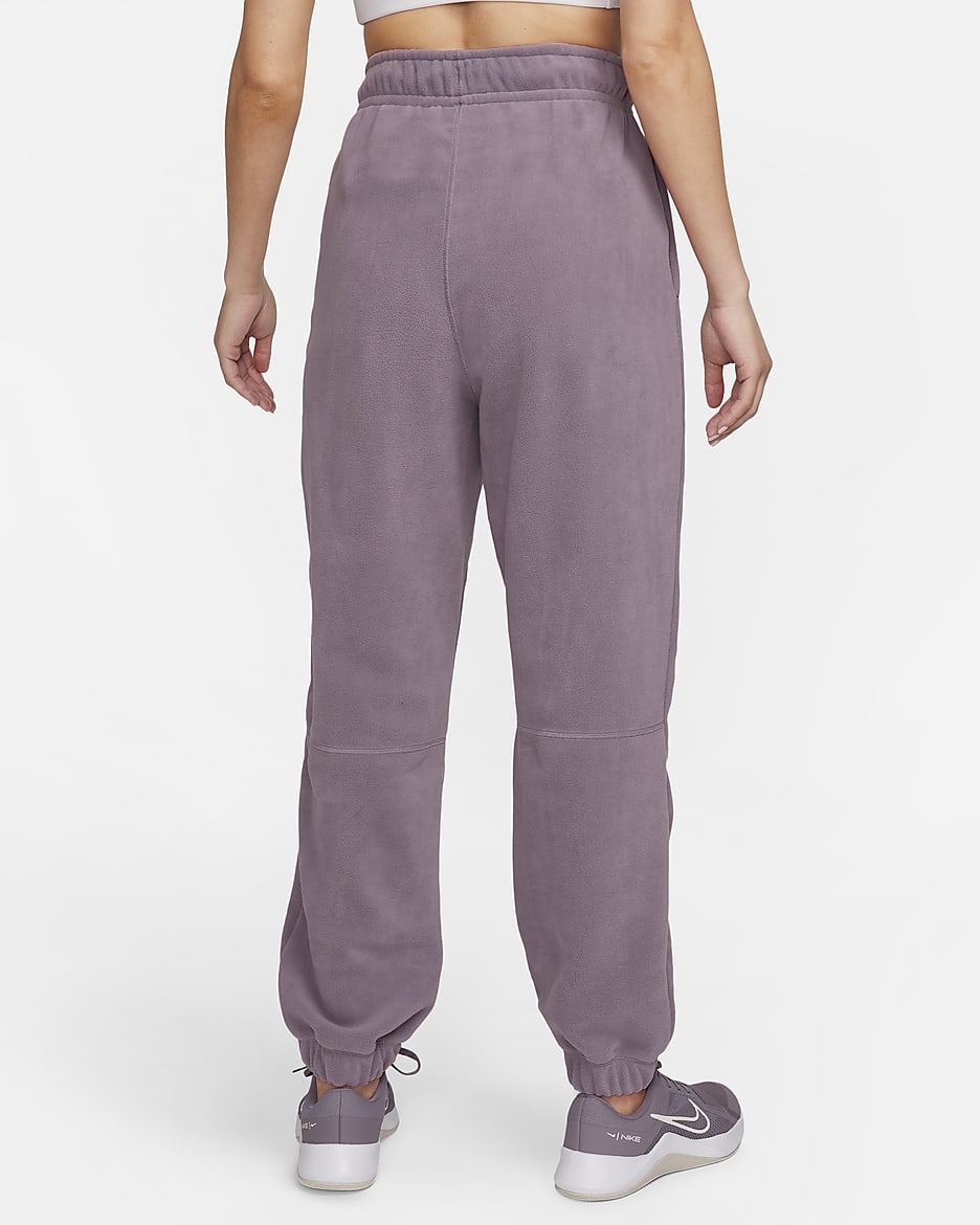 Nike Therma-FIT One lockere Fleecehose für Damen - Violet Dust/Pale Ivory