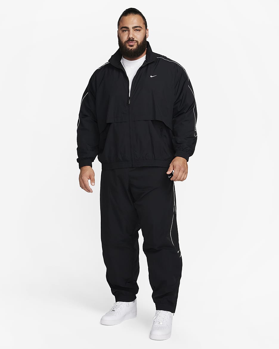 Nike Sportswear Solo Swoosh vevd treningsjakke til herre - Svart/Hvit