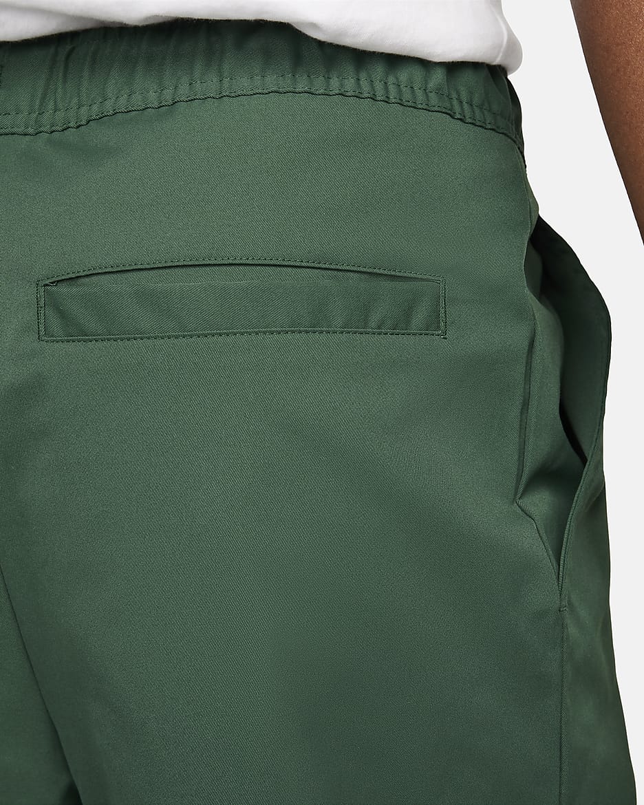 Nike Men's Woven Loose Fit Tapered Pants main image 0