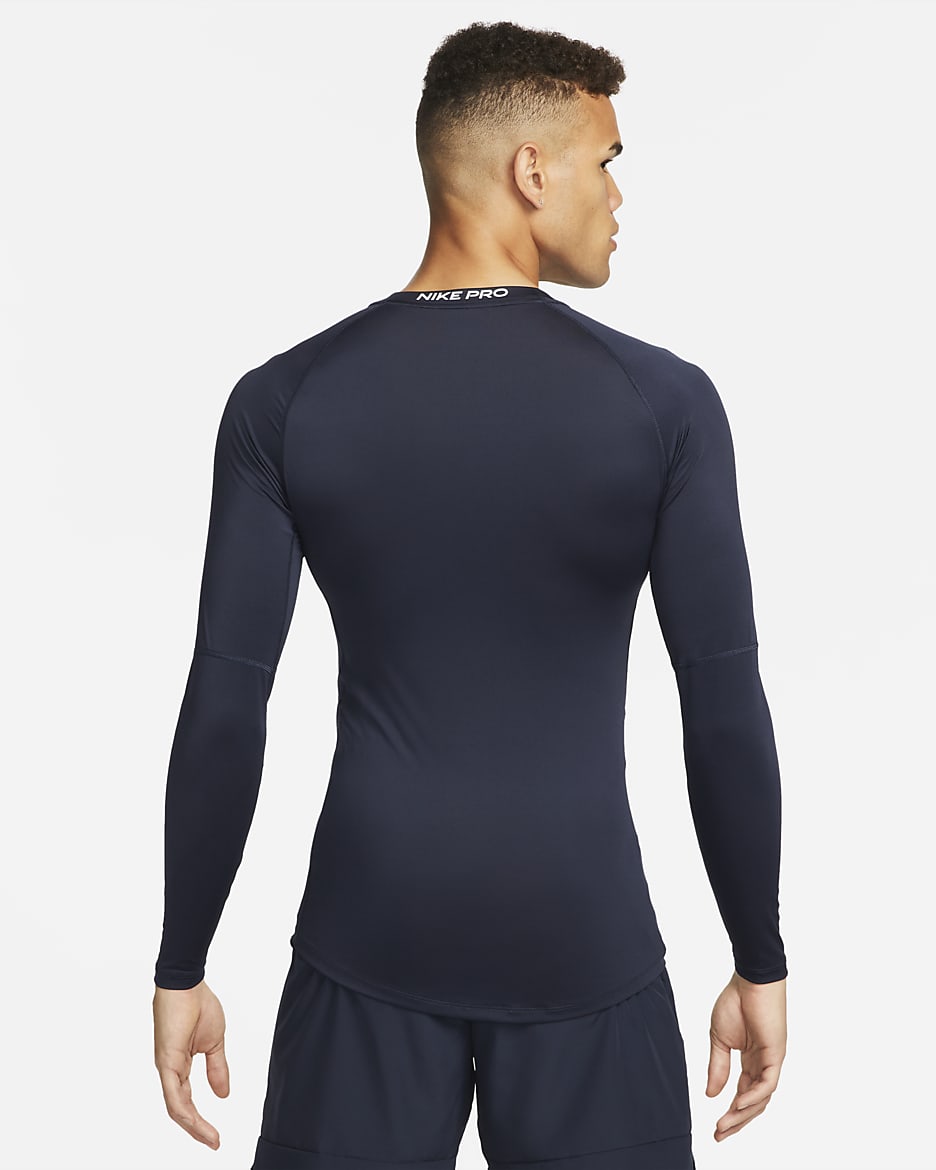 Nike Pro Dri-FIT tettsittende, langermet treningsoverdel til herre - Obsidian/Hvit