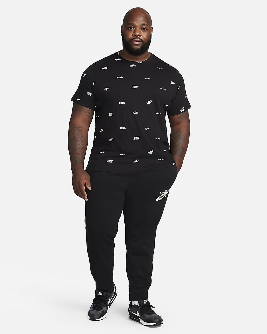 Playera con estampado en toda la prenda para hombre Nike Club - Negro