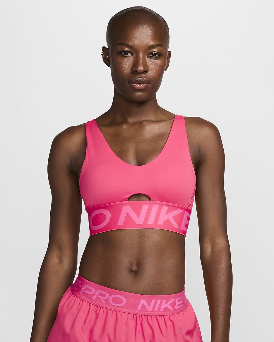 Bra deportivo de media sujeción con almohadillas para mujer Nike Pro Indy Plunge - Rosa margarita/Rosa paleta/Blanco