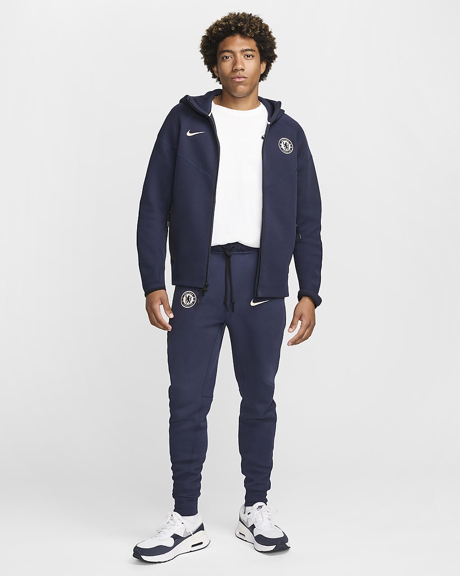 Chelsea F.C. Tech Fleece Windrunner Men's Nike Football Full-Zip Hoodie - Obsidian/Guava Ice