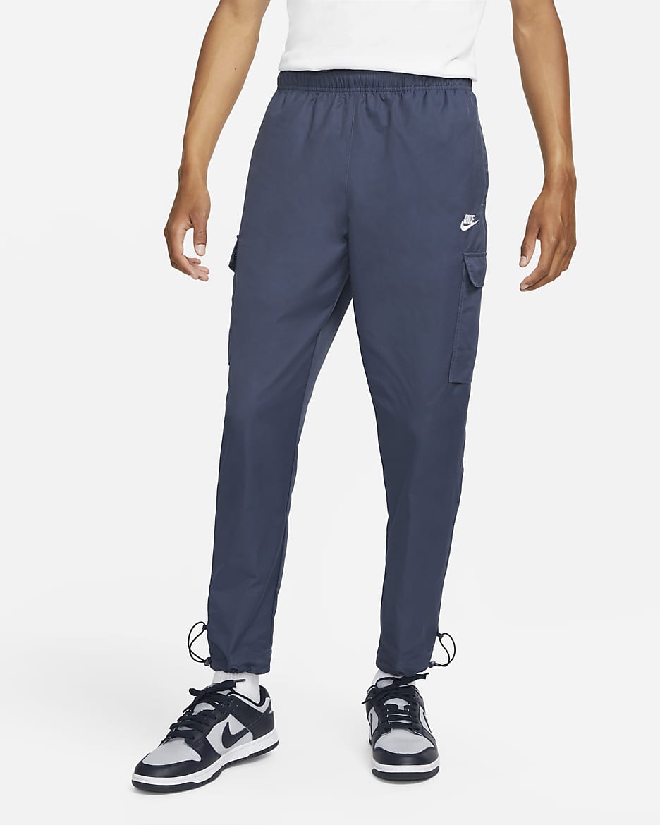 Vævede Nike Sportswear Repeat-bukser til mænd - Thunder Blue/hvid