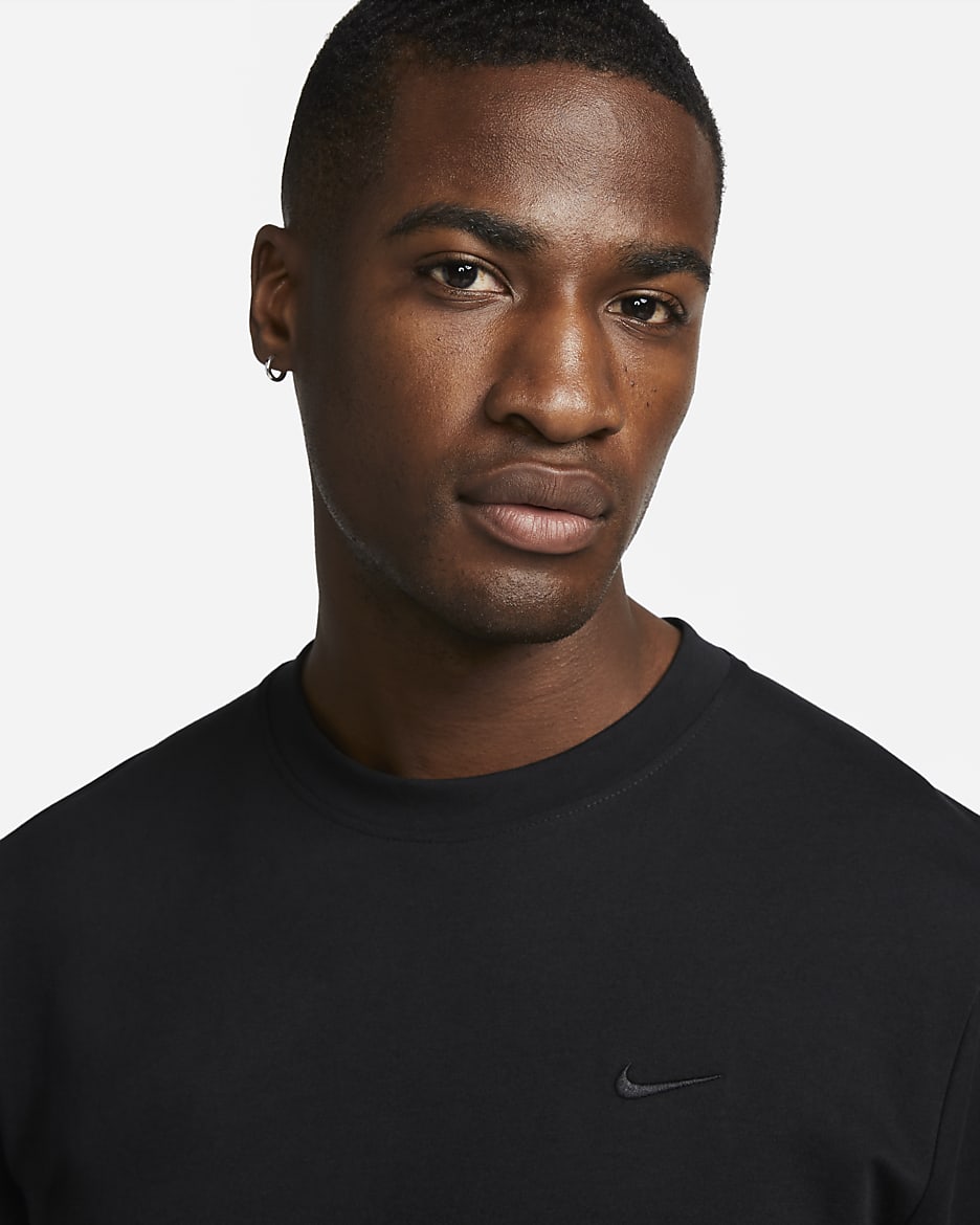 Haut à manches courtes Dri-FIT Nike Primary pour homme - Noir/Noir