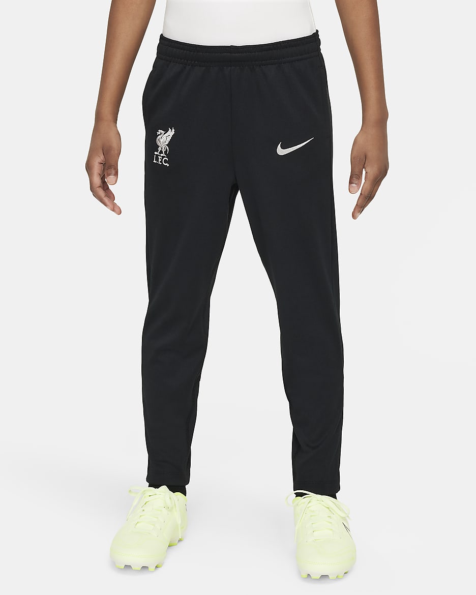 Liverpool F.C. Academy Pro Younger Kids' Nike Dri-FIT Football Knit Pants - Black/Gym Red/Light Orewood Brown